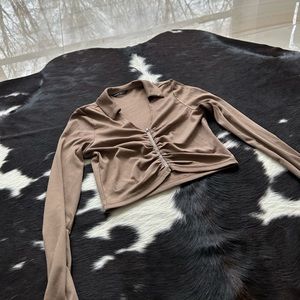 Cropped , zips in front